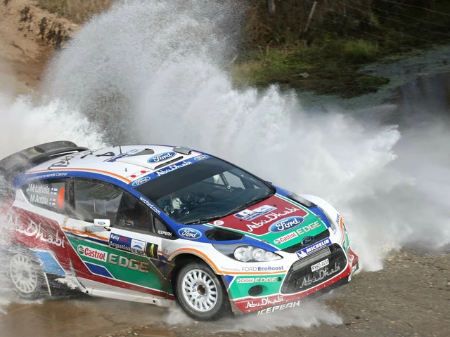 What are the 2 sticks used by the driver in a rally car?